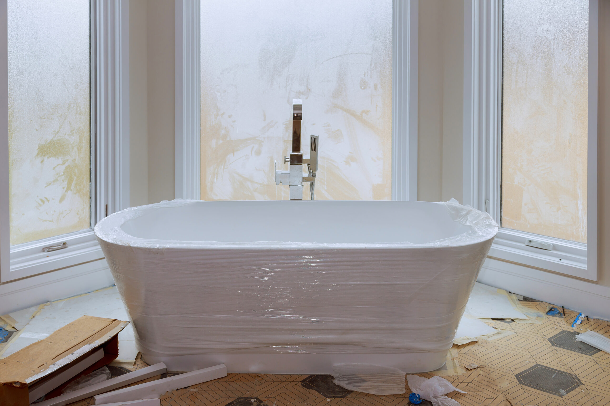 master bath new construction home with white tub scaled